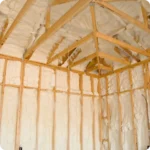 photo of a roof with covered in spray foam sealant